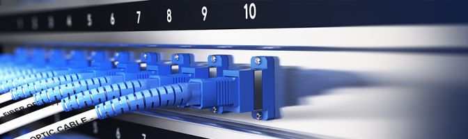 fiber-optic cables into a rack-mount router