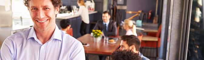 Male restaurant owner, portrait with arms crossed