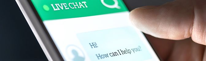 Closeup of mobile phone screen showing a live chat session.