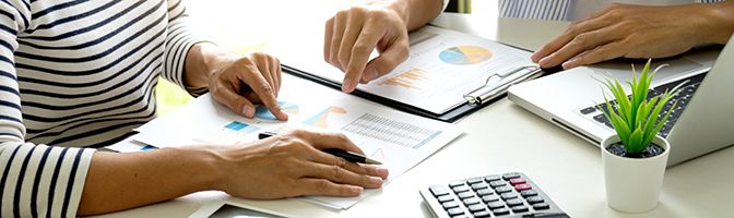 Business partners going over financial documents