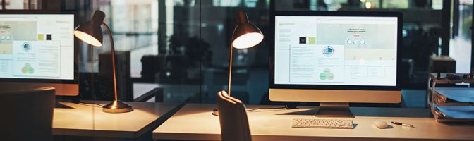 computers sitting on a desk