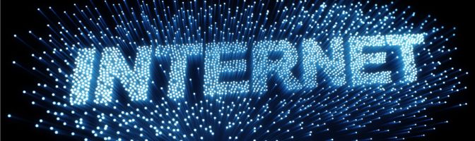 The word internet spelled out in fiber optic cable lights
