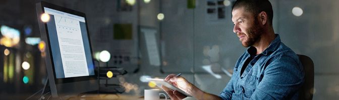 man working at computer in office