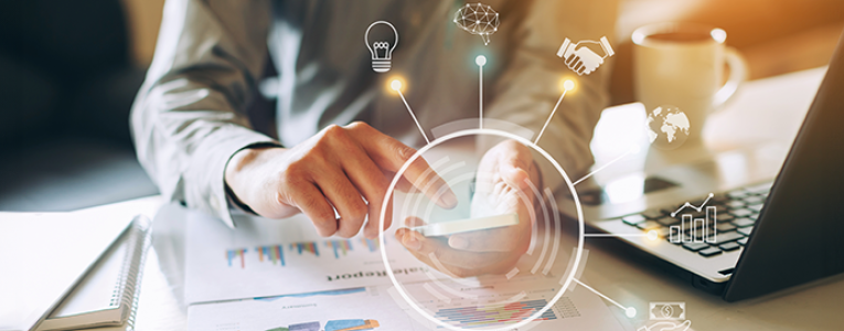 Businessman working on project with technology graphics