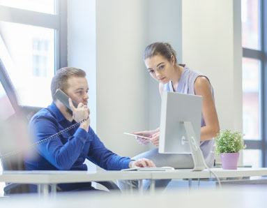 man and woman on conference call