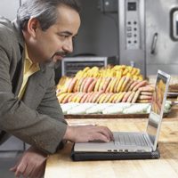 Middle-aged man on his laptop