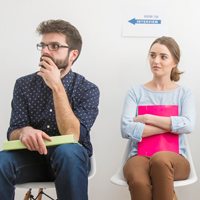 A guy and a girl sitting together