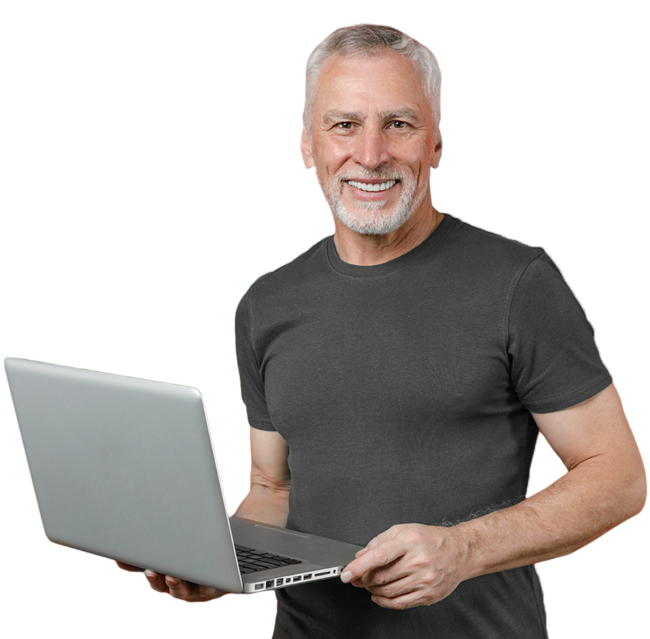 Middle aged man in casual clothing holding a laptop and looking at the screen